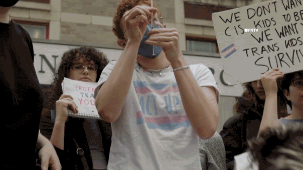 Trans activists inject themselves with hormones in viral stunt protesting Trump’s DOJ deal with NYU